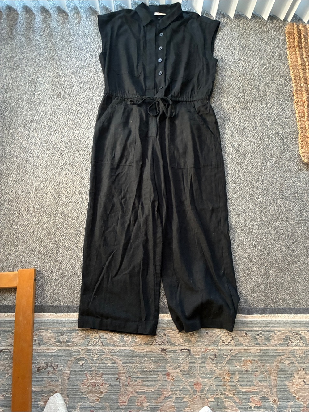 Black Sleeveless Button-Front Jumpsuit with Tie Waist